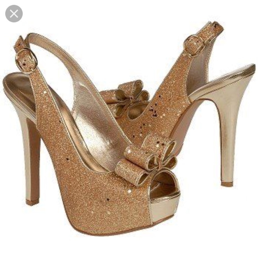 Night moves peep toe gold glitter heel.